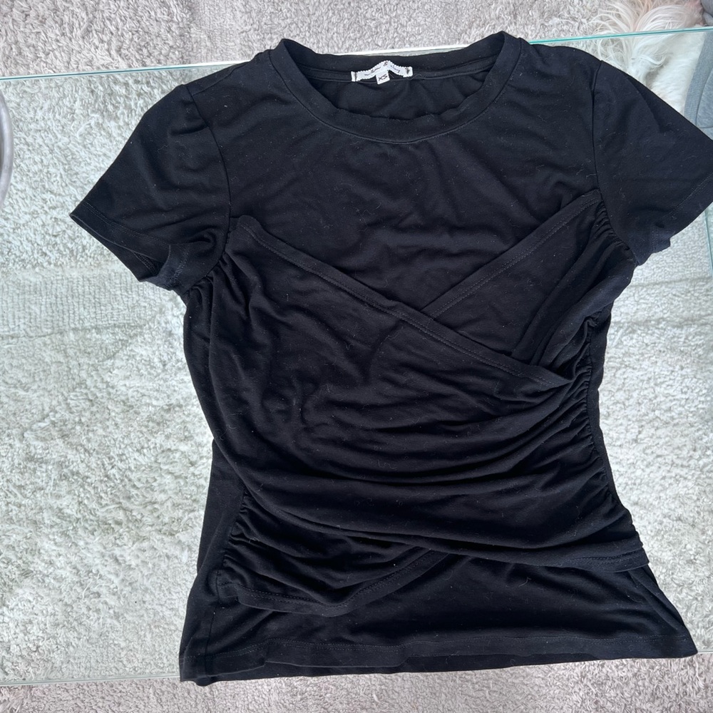 Black shirt, really casual and able to style with anything